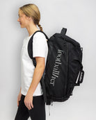 The Footballher 3-in-1 kit bag shown being worn as a backpack.