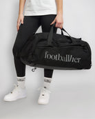 Footballher 3-in-1 Kit Bag shown being used as a carry bag.