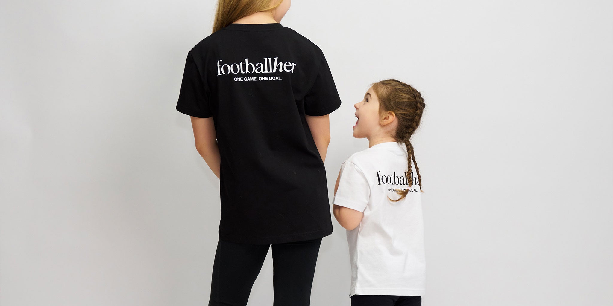 Girl footballers wearing the off field product.